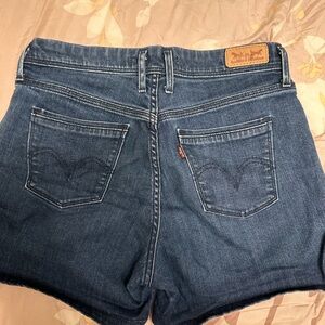 Levi's Blue Jean Shorts with Raw Hem and Distressed Look